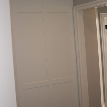 wainscot wall with hidden door