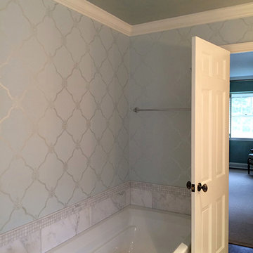 Bathrooms: Mary’s custom Moroccan design stencil shown in a soft blue metallic