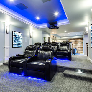 Inspiration for a transitional enclosed carpeted and gray floor home theater remodel in Baltimore with gray walls