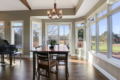 Example of a minimalist dining room design in Other