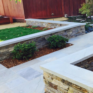 Mid-sized contemporary backyard partial sun garden in San Francisco with with path and natural stone pavers for fall.