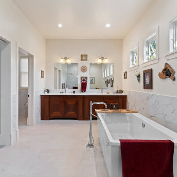 Primary Bathroom with Tub and Double Vanity