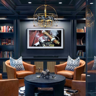 Photo of a large traditional fully buried basement in Chicago with no fireplace, grey walls, dark hardwood flooring and brown floors.