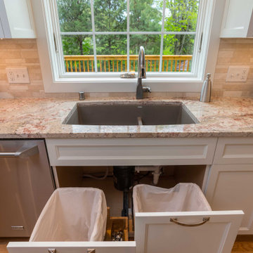 Modern Kitchen with White Flat Panel Shaker Cabinets & Natural Stone Backsplash