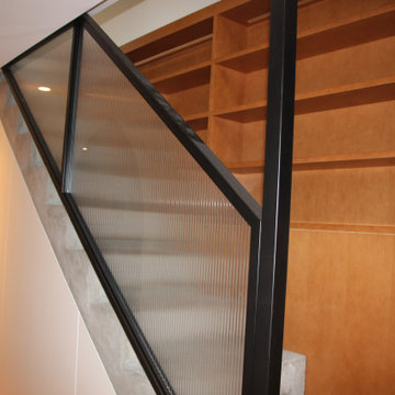 Glass and black metal railings