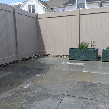 Bluestone Patio, Privacy Fence, and Dry-Stack Retaining Terrace