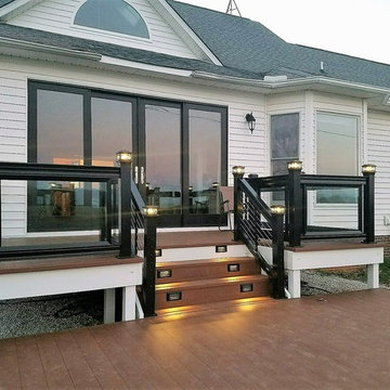 Decks with glass handrails and cable rails