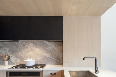 Example of a trendy kitchen design in Toronto