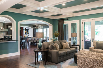 Living room - contemporary open concept dark wood floor living room idea in Other with green walls