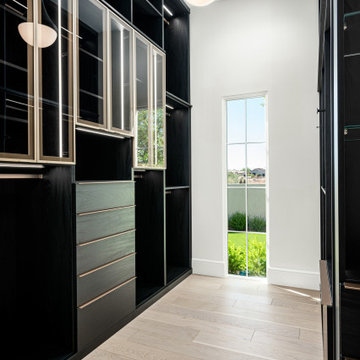 His Primary Closet with Black Built-Ins