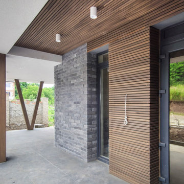 Modern two-story house with a terrace