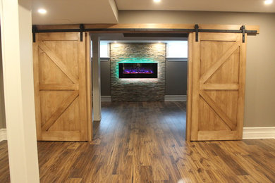 Basement - modern basement idea in Ottawa