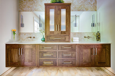 Shower bench - large contemporary master porcelain tile and double-sink shower bench idea in Indianapolis with recessed-panel cabinets, medium tone wood cabinets, a bidet, an undermount sink, quartz countertops, white countertops and a floating vanity