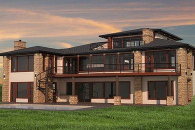 Large transitional beige two-story brick exterior home idea in Minneapolis with a hip roof