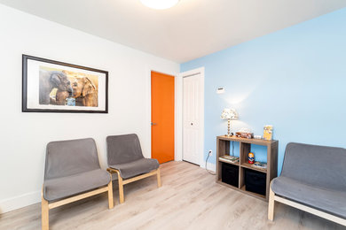 Inspiration for a mid-sized eclectic walk-out basement remodel in Vancouver