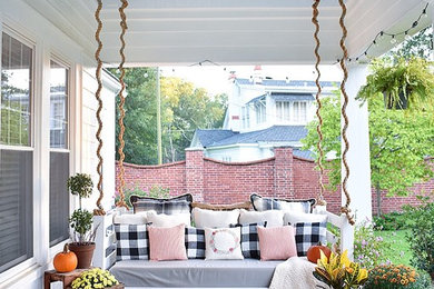 This is an example of a farmhouse porch design in Other.