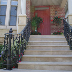 Solid stone stairs with ornamental iron railing - Products