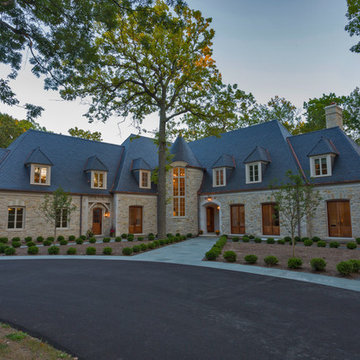 French Country Exterior at dusk