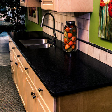 Black Antique granite kitchen by Down East Fabrication