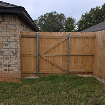 Privacy fence with wide gate