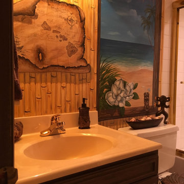 Polynesian Themed Mural thoughout a bathroom, hand-painted by Tom Taylor