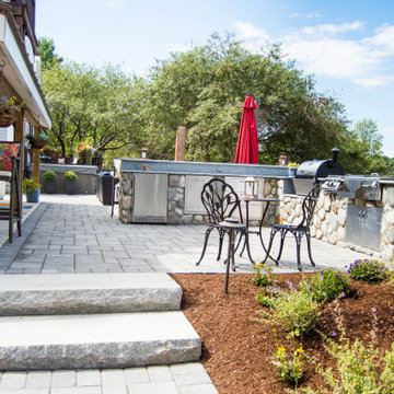 Outdoor Kitchen, Firepit, Patio, Stairs, Retaining Wall and Flowerbeds