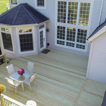 Deck and Unilock Paver Patio with Firepit & Landscaping