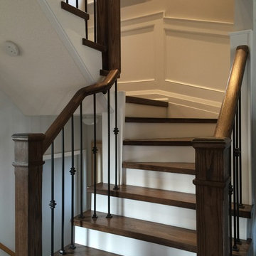 Espresso Stained Oak Staircase w/ Wainscoting, doors & trim