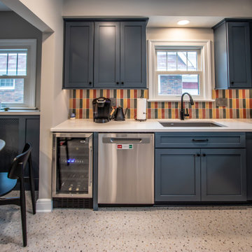 Vibrant and Colorful Kitchen with Custom Cabinetry and Calacatta Duolina Quartz