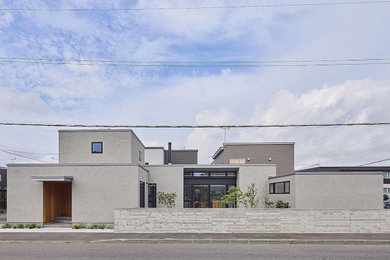 他の地域にあるおしゃれな家の外観の写真