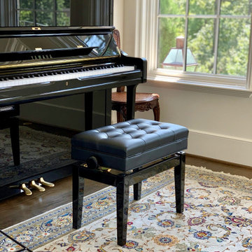 Music & Persian Kashan Art come together in this simple & classic music studio.