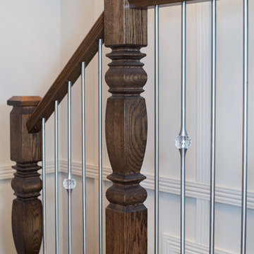 Hour-glass posts, modern stair case