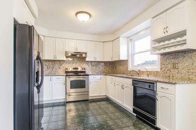 Example of a transitional kitchen design in Toronto
