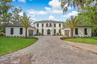 Example of a tuscan home design design in Jacksonville