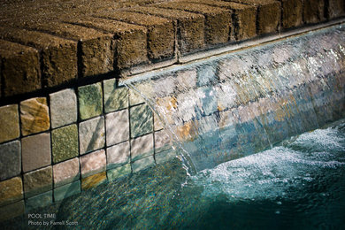 Inspiration for a mid-sized timeless backyard brick and rectangular pool fountain remodel in Sacramento