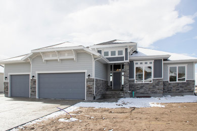 Mid-sized blue one-story concrete fiberboard house exterior photo in Salt Lake City with a shingle roof