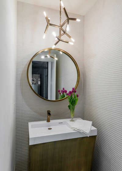 Contemporary Powder Room by Constructionologists
