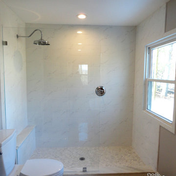 Custom Glass Spray Panels, Splash Guards, and Fixed Panel Shower Units