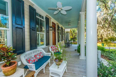 This is an example of a country porch design in Charleston.