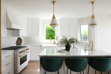 Example of a transitional kitchen design in Vancouver
