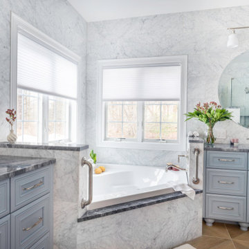 Universal Design in Classic Marble Primary Bathroom