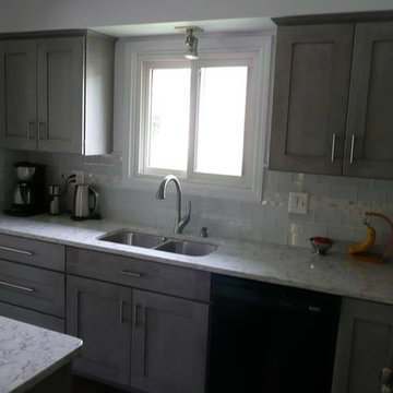 Medallion Cherry Peppercorn Cabinets with Rococo Quartz countertops