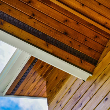 Cedar stained soffits with rainscreen accents