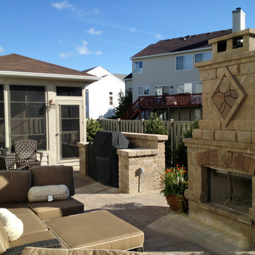 Screen Porch & Patio with Outdoor Fireplace and Grill Surround in Woodridge, IL