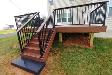 Deck building with Armadillo Decking and Black Aluminum rails