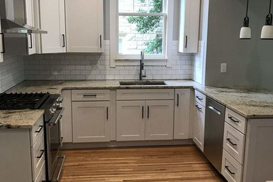 Arts and crafts kitchen photo in Other