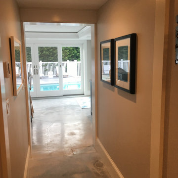 A fully equipped laundry room with a built ins