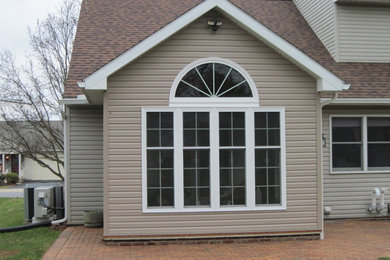 Sunroom - traditional sunroom idea in Other
