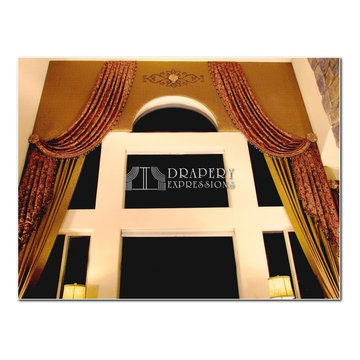 Two Story Arched Cornice Window Treatment