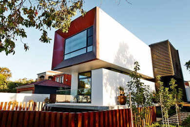 Photo of a contemporary three-storey exterior in Melbourne.